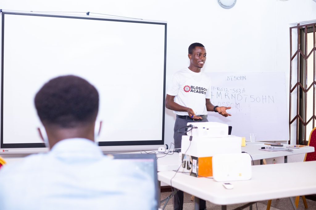 A man standing in front of a whiteboard